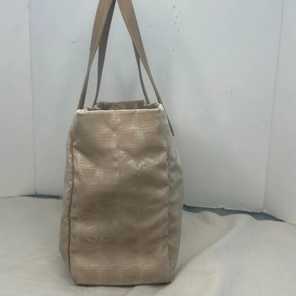 Chanel Travel Line tote in light beige / pale pinkish canvas